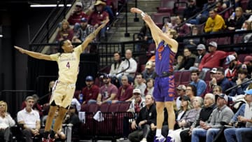 Jan 28, 2023; Tallahassee, Florida, USA; Clemson Tigers forward Hunter Tyson (5) shoots the ball against Florida State Seminoles guard Caleb Mills (4) during the first half at Donald L. Tucker Center. Mandatory Credit: Melina Myers-USA TODAY Sports