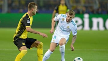 DORTMUND, GERMANY - SEPTEMBER 26: Andrey Yarmolenko of Dortmund , Toni Kroos of Real Madrid battle for the ball during the UEFA Champions League group H match between Borussia Dortmund and Real Madrid at Signal Iduna Park on September 26, 2017 in Dortmund, Germany. (Photo by TF-Images/TF-Images via Getty Images)