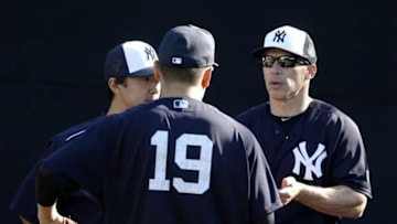 Feb 22, 2016; Tampa, FL, USA; New York Yankees manager Joe Girardi (28) talks with starting pitcher Masahiro Tanaka (19) during practice at George M. Steinbrenner Stadium. Mandatory Credit: Butch Dill-USA TODAY Sports