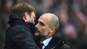 MANCHESTER, ENGLAND - MARCH 19: Jurgen Klopp, Manager of Liverpool (L) and Josep Guardiola, Manager of Manchester City (R) embrace prior to the Premier League match between Manchester City and Liverpool at Etihad Stadium on March 19, 2017 in Manchester, England. (Photo by Laurence Griffiths/Getty Images)