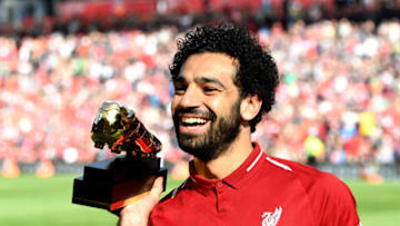 LIVERPOOL, ENGLAND - MAY 13: Mohamed Salah of Liverpool pose for a photo with his Premier League Golden Boot Award after the Premier League match between Liverpool and Brighton and Hove Albion at Anfield on May 13, 2018 in Liverpool, England. (Photo by Michael Regan/Getty Images)