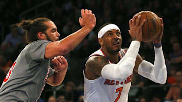 Dec 19, 2015; New York, NY, USA; New York Knicks forward Carmelo Anthony (7) drives to the basket against Chicago Bulls center Joakim Noah (13) during the first half at Madison Square Garden. Mandatory Credit: Noah K. Murray-USA TODAY Sports