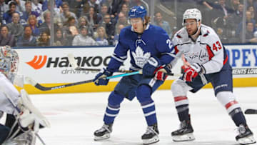 Tom Wilson #43 of the Washington Capitals skates against Kasperi Kapanen #24 of the Toronto Maple Leafs during an NHL game. (Photo by Claus Andersen/Getty Images)