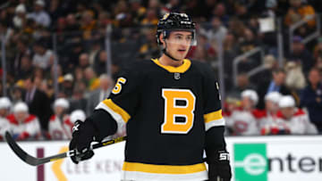 BOSTON, MASSACHUSETTS - DECEMBER 01: Connor Clifton #75 of the Boston Bruins looks on during the second period of the game against the Montreal Canadiens at TD Garden on December 01, 2019 in Boston, Massachusetts. (Photo by Maddie Meyer/Getty Images)