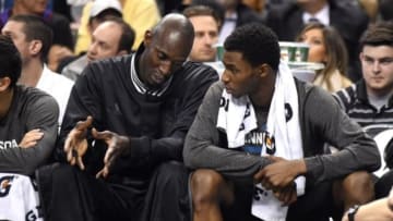 Mar 18, 2015; Toronto, Ontario, CAN; Minnesota Timberwolves forward Kevin Garnett (21) gestures as he talks with forward Andrew Wiggins (22) on the bench during the Timberwolves 105-100 loss to Toronto Raptors at Air Canada Centre. Mandatory Credit: Dan Hamilton-USA TODAY Sports