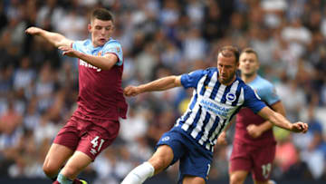BRIGHTON, ENGLAND - AUGUST 17: Glenn Murray of Brighton and Hove Albion competes for the ball with Declan Rice of West Ham United during the Premier League match between Brighton & Hove Albion and West Ham United at American Express Community Stadium on August 17, 2019 in Brighton, United Kingdom. (Photo by Mike Hewitt/Getty Images)