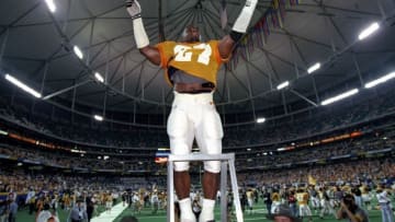 5 Dec 1998: Linebacker Al Wilson #27 of the Tennessse Volunteers stands on a ladder during the SEC Championships against the Mississippi State Bulldogs at the Georgia Dome in Athens, Georgia. Tennessee defeated Mississippi St. 24-14.