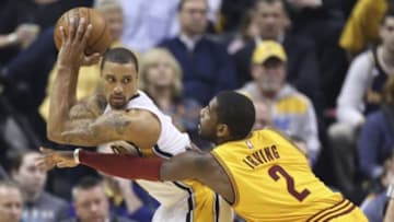 Feb 6, 2015; Indianapolis, IN, USA; Indiana Pacers guard George Hill (3) is guarded by Cleveland Cavaliers guard Kyrie Irving (2) at Bankers Life Fieldhouse. Mandatory Credit: Brian Spurlock-USA TODAY Sports