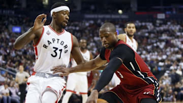 Jan 22, 2016; Toronto, Ontario, CAN; Miami Heat guard Dwyane Wade (3) controls the ball against Toronto Raptors forward Terrence Ross (31) at the Air Canada Centre. Toronto defeated Miami 101-81. Mandatory Credit: John E. Sokolowski-USA TODAY Sports