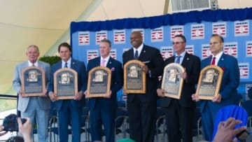 Jul 27, 2014; Cooperstown, NY, USA; Bobby Cox and Tony La Russa and Tom Glavine and Frank Thomas and Greg Maddux and Joe Torre pose with their Hall of Fame plaques during the class of 2014 national baseball Hall of Fame induction ceremony at National Baseball Hall of Fame. Mandatory Credit: Gregory J. Fisher-USA TODAY Sports