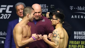 Dec 29, 2016; Las Vegas, NV, USA; Louis Smolka (left) faces off against Ray Borg during weigh ins for UFC 207 at T Mobile Arena. Mandatory Credit: Mark J. Rebilas-USA TODAY Sports