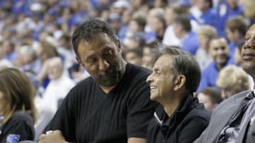 Sep 13, 2015; Lexington, KY, USA; Vlade Divac vice president of basketball operations and general manager of the Sacramento Kings (L) talks with owner Vivek Ranadiv (R) during the Alumni Game between North Carolina and Kentucky at Rupp Arena. Mandatory Credit: Mark Zerof-USA TODAY Sports