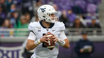 FORT WORTH, TX - NOVEMBER 29: Jarret Doege #2 of the West Virginia Mountaineers looks to throw against the TCU Horned Frogs in the first half at Amon G. Carter Stadium on November 29, 2019 in Fort Worth, Texas. (Photo by Ron Jenkins/Getty Images)