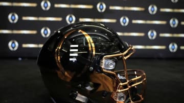 Jan 11, 2022; Indianapolis, Indiana, USA; A detailed view of College Football Playoff National Championship logo helmet at 2022 Indianapolis Host Committee press conference at the JW Marriott. Mandatory Credit: Kirby Lee-USA TODAY Sports