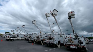 KENNER, LOUISIANA - AUGUST 24: Electric utility trucks are staged along Lake Pontchartrain as in preparation for Tropical Storm Marco on August 24, 2020 in Kenner, Louisiana. The Gulf Coast is expecting to see some impact from Marco followed by Hurricane Laura. (Photo by Sean Gardner/Getty Images)