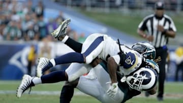 LOS ANGELES, CA - DECEMBER 10: Running back Jay Ajayi #36 of the Philadelphia Eagles is tackled by cornerback Nickell Robey-Coleman #23 of the Los Angeles Rams during the fourth quarter at Los Angeles Memorial Coliseum on December 10, 2017 in Los Angeles, California. The Eagles defeated the Rams 43-35. (Photo by Jeff Gross/Getty Images)