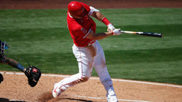 TEMPE, ARIZONA - MARCH 18: Mike Trout #27 of the Los Angeles Angels hits a single against the Milwaukee Brewers during the fourth inning of the MLB spring training baseball game at Tempe Diablo Stadium on March 18, 2021 in Tempe, Arizona. (Photo by Ralph Freso/Getty Images)