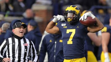 ANN ARBOR, MI - NOVEMBER 16: Tarik Black #7 of the Michigan Wolverines celebrates a touchdown catch during the third quarter of the game against the Michigan State Spartans at Michigan Stadium on November 16, 2019 in Ann Arbor, Michigan. Michigan defeated Michigan State 40-10. (Photo by Leon Halip/Getty Images)