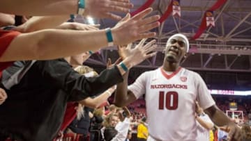 Jan 22, 2015; Fayetteville, AR, USA; Arkansas Razorbacks guard Bobby Portis (10) gives fans high fives following a game against the Alabama Crimson Tide at Bud Walton Arena. Arkansas defeated Alabama 93-91 in overtime. Mandatory Credit: Beth Hall-USA TODAY Sports