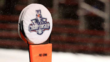 The American Athletic Conference Championship logo between Cincinnati Bearcats and Tulsa. Getty Images.
