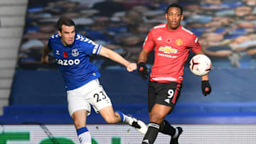 Everton's Irish defender Seamus Coleman (L) vies with Manchester United's French striker Anthony Martial during the English Premier League football match between Everton and Manchester United at Goodison Park in Liverpool, north west England on November 7, 2020. (Photo by Paul ELLIS / POOL / AFP) / RESTRICTED TO EDITORIAL USE. No use with unauthorized audio, video, data, fixture lists, club/league logos or 'live' services. Online in-match use limited to 120 images. An additional 40 images may be used in extra time. No video emulation. Social media in-match use limited to 120 images. An additional 40 images may be used in extra time. No use in betting publications, games or single club/league/player publications. / (Photo by PAUL ELLIS/POOL/AFP via Getty Images)