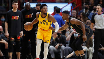 Donovan Mitchell #45 of the Utah Jazz is defended by Jimmy Butler #22 of the Miami Heat(Photo by Michael Reaves/Getty Images)