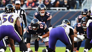 CHICAGO, ILLINOIS - NOVEMBER 21: Quarterback Andy Dalton #14 of the Chicago Bears calls signals against the Baltimore Ravens at Soldier Field on November 21, 2021 in Chicago, Illinois. (Photo by Jamie Sabau/Getty Images)