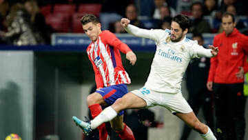 MADRID, SPAIN - NOVEMBER 18: (L-R) Lucas Hernandez of Atletico Madrid, Isco of Real Madrid during the Spanish Primera Division match between Atletico Madrid v Real Madrid at the Estadio Wanda Metropolitano on November 18, 2017 in Madrid Spain (Photo by Eric Verhoeven/Soccrates/Getty Images)