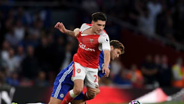 LONDON, ENGLAND - SEPTEMBER 24: Hector Bellerin of Arsenal has his shirt pulled Marcos Alonso of Chelsea during the Premier League match between Arsenal and Chelsea at the Emirates Stadium on September 24, 2016 in London, England. (Photo by Shaun Botterill/Getty Images)
