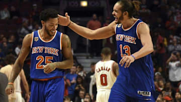 Nov 4, 2016; Chicago, IL, USA; New York Knicks center Joakim Noah (13) and New York Knicks guard Derrick Rose (25) celebrate during the second half at the United Center. The Knicks won 117-104. Mandatory Credit: David Banks-USA TODAY Sports