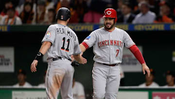 TOKYO, JAPAN - NOVEMBER 08: Catcher J.T. Realmuto #11 of the Miami Marlins celebrates scoring a run to make it 7-0 with Infielder Eugenio Suarez #7 of the Cincinnati Reds in the top of 3rd inning during the exhibition game between Yomiuri Giants and the MLB All Stars at Tokyo Dome on November 8, 2018 in Tokyo, Japan. (Photo by Kiyoshi Ota/Getty Images)