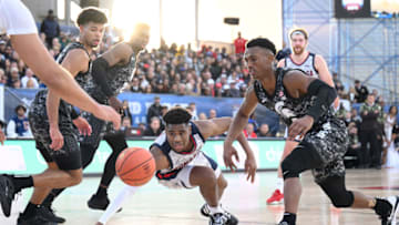 Nov 11, 2022; San Diego, California, US; Gonzaga Bulldogs guard Malachi Smith (13) dives for a loose ball during the first half against the Michigan State Spartans at USS Abraham Lincoln. Mandatory Credit: Orlando Ramirez-USA TODAY Sports