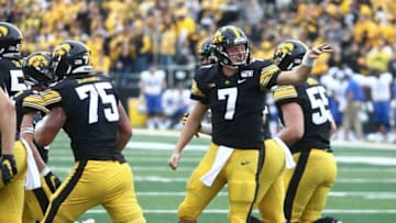 IOWA CITY, IOWA- SEPTEMBER 28: Quarterback Spencer Petras #7 of the Iowa Hawkeyes celebrates a touchdown during the second half against the Middle Tennessee Blue Raiders on September 28, 2019 at Kinnick Stadium in Iowa City, Iowa. (Photo by Matthew Holst/Getty Images)