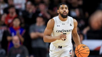 Cincinnati Bearcats guard David DeJulius controls the ball against the Temple Owls at Fifth Third Arena. USA Today.