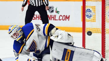 Dec 13, 2016; Nashville, TN, USA; St. Louis Blues goalie Jake Allen (34) makes a save during the third period against the Nashville Predators at Bridgestone Arena. Mandatory Credit: Christopher Hanewinckel-USA TODAY Sports