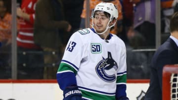 NEW YORK, NEW YORK - FEBRUARY 01: Quinn Hughes #43 of the Vancouver Canucks celebrates his game winning goal in overtime against the New York Islanders at Barclays Center on February 01, 2020 in New York City. (Photo by Mike Stobe/NHLI via Getty Images)