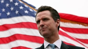 SAN FRANCISCO - JUNE 16: San Francisco mayor Gavin Newsom speaks during a rally against cutting funding to San Francisco public safety workers June 16, 2009 in San Francisco, California. Hundreds of San Francisco public safety workers and supporters protested proposed budget cuts that would call for closing San Francisco fire stations and laying off police officers and firefighters. (Photo by Justin Sullivan/Getty Images)