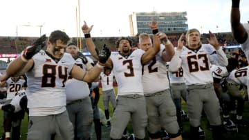 AMES, IA - OCTOBER 26: The Oklahoma State Cowboys celebrate after winning 34-27 over the Iowa State Cyclones at Jack Trice Stadium on October 26, 2019 in Ames, Iowa. The Oklahoma State Cowboys won 34-27 over the Iowa State Cyclones.(Photo by David Purdy/Getty Images)