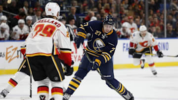 Nov 21, 2016; Buffalo, NY, USA; Buffalo Sabres center Derek Grant (27) takes a shot on goal during the second period against the Calgary Flames at KeyBank Center. Mandatory Credit: Timothy T. Ludwig-USA TODAY Sports