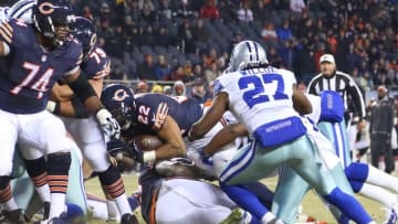 Dec 4, 2014; Chicago, IL, USA; Chicago Bears running back Matt Forte (22) scores a touchdown with Dallas Cowboys free safety J.J. Wilcox (27) defending during the second half at Soldier Field. Dallas won 41-28. Mandatory Credit: Dennis Wierzbicki-USA TODAY Sports