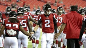 Sep 18, 2014; Atlanta, GA, USA; Atlanta Falcons quarterback Matt Ryan (2) greets running back Jacquizz Rodgers (32) before their game against the Tampa Bay Buccaneers at Georgia Dome. Mandatory Credit: Jason Getz-USA TODAY Sports