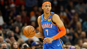 Darius Bazley #7 of the Oklahoma City Thunder handles the ball during the first half of the NBA game at Footprint Center on December 23, 2021 in Phoenix, Arizona. NOTE TO USER: User expressly acknowledges and agrees that, by downloading and or using this photograph, User is consenting to the terms and conditions of the Getty Images License Agreement. (Photo by Christian Petersen/Getty Images)