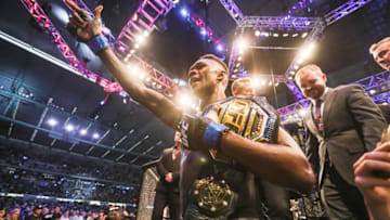 Middleweight title winner Israel Adesanya of New Zealand celebrates after defeating Robert Whittaker of Australia during the middleweight title bout of the UFC 243 fight night in Melbourne on October 6, 2019. (Photo by ASANKA BRENDON RATNAYAKE / AFP) / -- IMAGE RESTRICTED TO EDITORIAL USE - STRICTLY NO COMMERCIAL USE -- (Photo by ASANKA BRENDON RATNAYAKE/AFP via Getty Images)