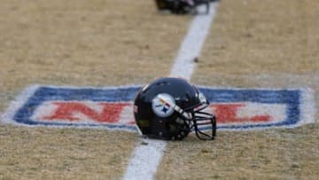Dec 22, 2013; Green Bay, WI, USA; A Pittsburgh Steelers helmet sits on the field during warmups prior to the game against the Green Bay Packers at Lambeau Field. Pittsburgh won 38-31. Mandatory Credit: Jeff Hanisch-USA TODAY Sports