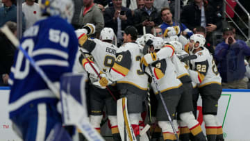 Nov 8, 2022; Toronto, Ontario, CAN; Vegas Golden Knights players celebrate a win against the Toronto Maple Leafs in overtime at Scotiabank Arena. Mandatory Credit: Nick Turchiaro-USA TODAY Sports