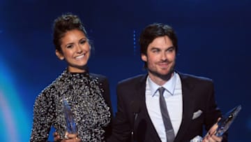 LOS ANGELES, CA - JANUARY 08: Actors Nina Dobrev (L) and Ian Somerhalder, winners of the Favorite On Screen Chemistry award for "The Vampire Diaries," speak onstage at The 40th Annual People's Choice Awards at Nokia Theatre L.A. Live on January 8, 2014 in Los Angeles, California. (Photo by Kevin Winter/Getty Images)