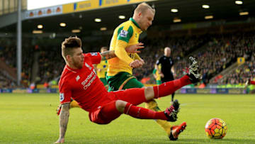 NORWICH, ENGLAND - JANUARY 23: Steven Naismith of Norwich City is fouled by Alberto Moreno of Liverpool resulting in the penalty kick during the Barclays Premier League match between Norwich City and Liverpool at Carrow Road on January 23, 2016 in Norwich, England. (Photo by Stephen Pond/Getty Images)