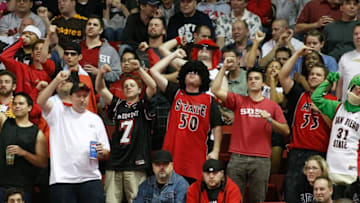 LAS VEGAS - MARCH 13: San Diego State Aztecs fans cheer during a game against the Brigham Young University Cougars during a semifinal game of the Conoco Mountain West Conference Basketball Championships at the Thomas & Mack Center March 13, 2009 in Las Vegas, Nevada. The Aztecs won 64-62. (Photo by Ethan Miller/Getty Images)