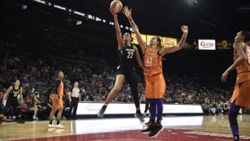 LAS VEGAS, NV - AUGUST 1: A'ja Wilson #22 of the Las Vegas Aces shoots the ball during game against the Phoenix Mercury on August 1, 2018 at the Mandalay Bay Events Center in Las Vegas, Nevada. NOTE TO USER: User expressly acknowledges and agrees that, by downloading and or using this Photograph, user is consenting to the terms and conditions of the Getty Images License Agreement. Mandatory Copyright Notice: Copyright 2018 NBAE (Photo by David Becker/NBAE via Getty Images)