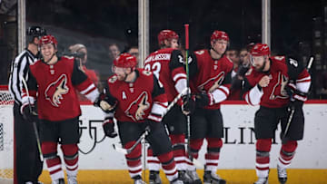 GLENDALE, ARIZONA - OCTOBER 17: (L-R) Clayton Keller #9, Phil Kessel #81, Oliver Ekman-Larsson #23, Christian Dvorak #18 and Derek Stepan #21 of the Arizona Coyotes celebrate after Kessel scored a power play goal against the Nashville Predators during the first period of the NHL game at Gila River Arena on October 17, 2019 in Glendale, Arizona. (Photo by Christian Petersen/Getty Images)